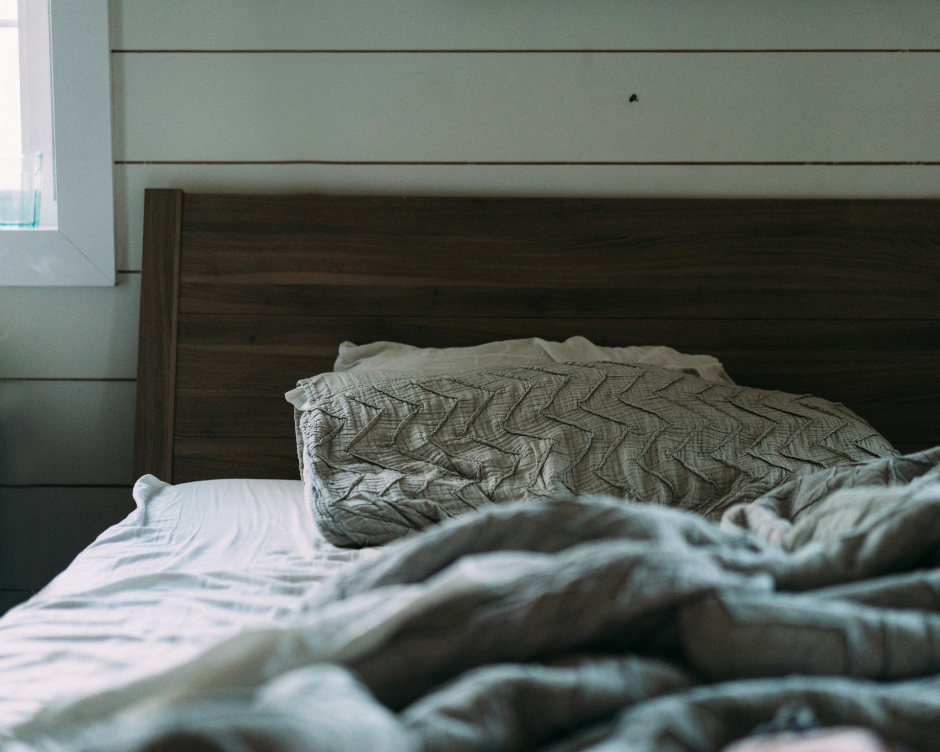 bedroom decor brown wooden bed with gray bedspread set